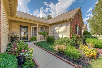 Beautiful Curb Appeal with professional landscaping and covered front porch