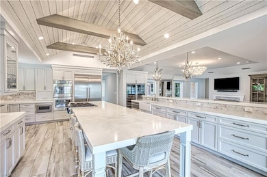 Kitchen featuring pendant lighting, wood ceiling, 