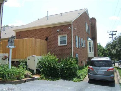 Exterior Back. Designated Parking Space for this Home! The other one is located in the Parking Lot