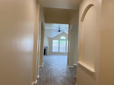 Step into a bright entryway with elegant arches se