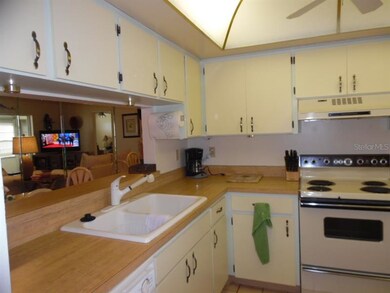 Tons of cabinets & that great view!