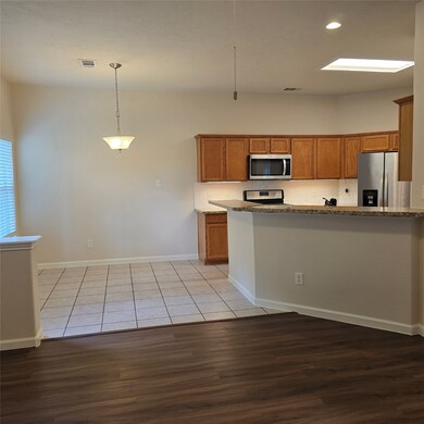 Bright, open kitchen and dining area. The kitchen