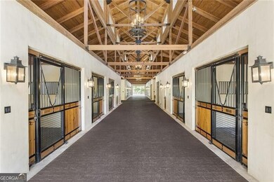 Extra wide matted barn aisles offer east west expo