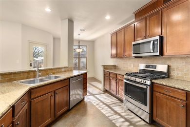 Kitchen featuring recessed lighting, stainless st