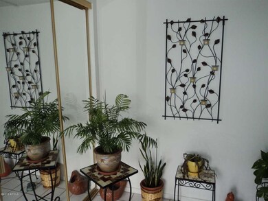 CORNER OF ENTRYWAY WITH CLOSETS