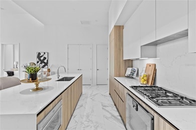 Kitchen and breakfast bar