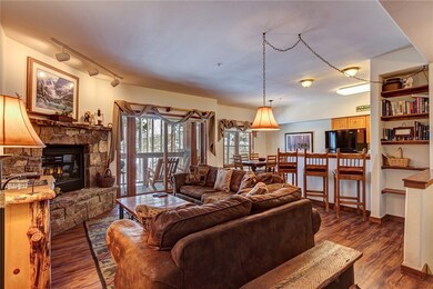 Cozy living room, kitchen and dining room.