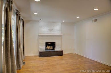 Fireplace with gas logs.