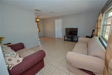 Formal living room leading to formal dining room
