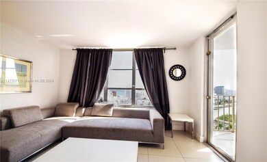 Unit is partially furnished. Large grey sofa is not included and has been removed.