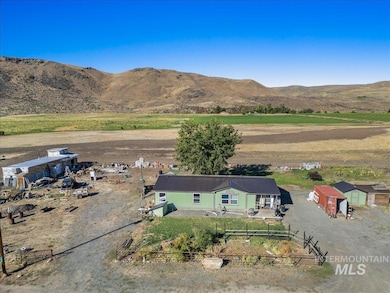 View of rural area featuring a mountain backdrop