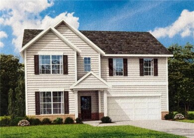 View of front facade featuring a front yard and a 