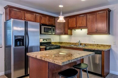 Granite countertops, stainless steel appliances