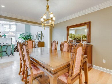 Hardwood floors and exquisite crown molding make t