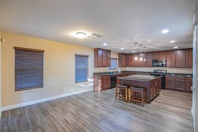 Open Kitchen featuring dining area
