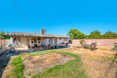 COVERED BACK PATIO WITH LAUNDRY HOOKUP