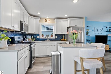 2087 Staghorn Ave, Grawn, MI 49637 - photo 5