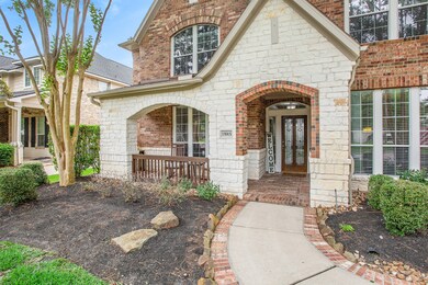 Walkway leads to a front porch.