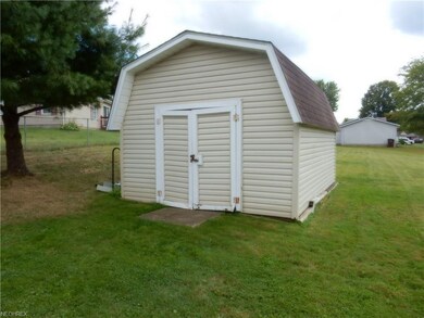 Sided storage shed. Great place to store your mowe