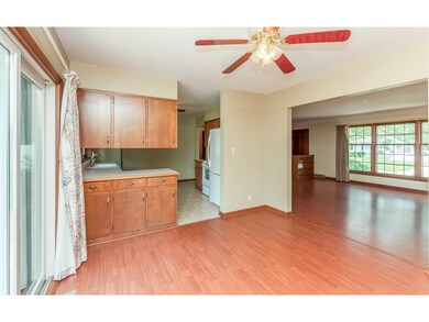 Dining room with walk-out sliding door to back yar