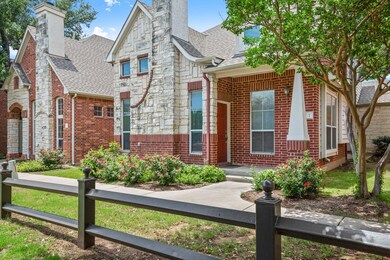 View of front of property with roof with shingles