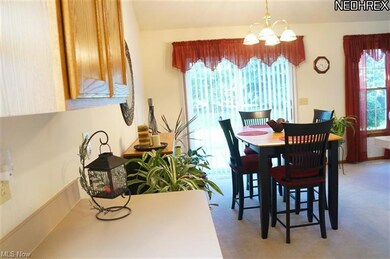 Dining area is conveniently located between the ki