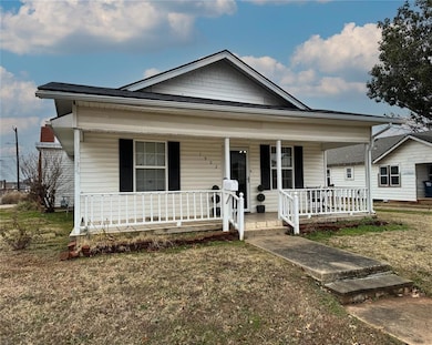 View of front of home featuring covered porch