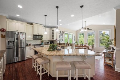 open and inviting kitchen with granite countertops