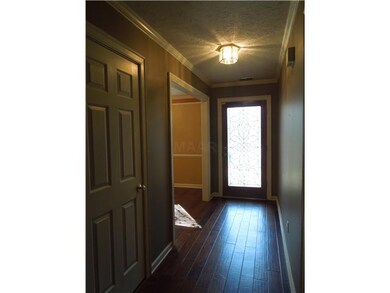 Hard to see the beautiful front door in this pictu