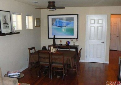 Dining area with hardwood flooring