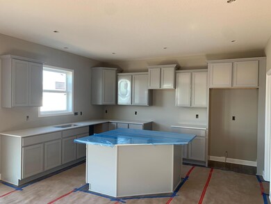 An awe-inspiring kitchen with a beautiful styled island is the perfect place for friends and family to gather around for years to come. (Actual home)