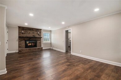 Spacious Living Room with Fireplace and Recessed L