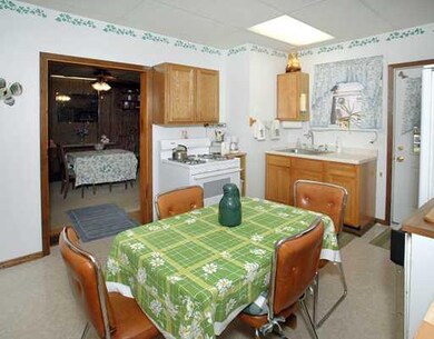 Kitchen. This picture shows off the kitchen much b