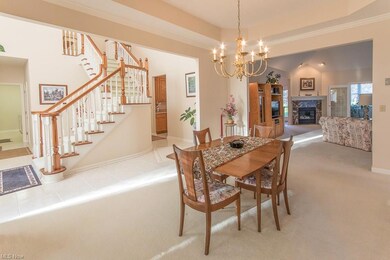 Dining room with trayed ceiling, open floor plan t