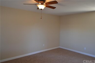 Spacious master bedroom with new ceiling fan, new 