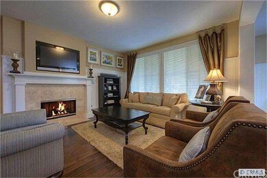 Wrapped in wainscoting and warmed by a crackling f