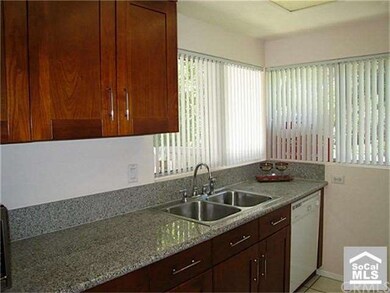 Maple cabinet and granite countertop with stainles
