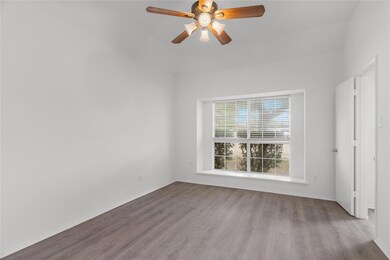 Unfurnished bedroom featuring light wood-type floo