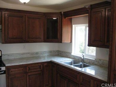 Remodeled Kitchen with new cabinets and granite co