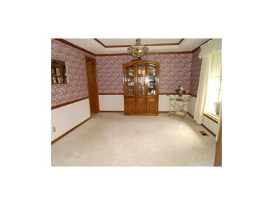 FORMAL DINING ROOM - ELEGANT CENTER HALL PLAN