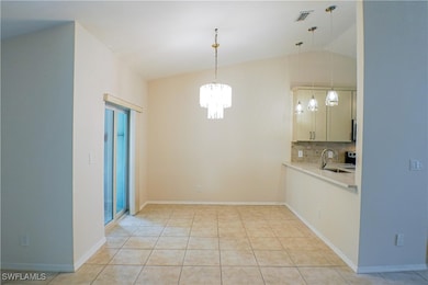 Unfurnished dining area with visible vents, basebo