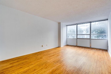 Spare room with light wood-style flooring, a text
