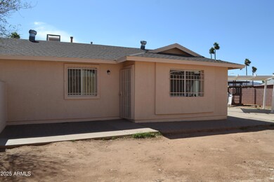 INSIDE FRONT GATE, VIEW OF HOME