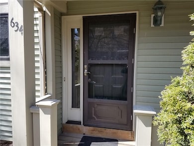 THE PRIVATE REAR ENTRANCE IS JUST A FEW STEPS FROM