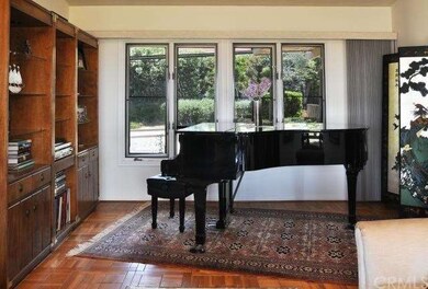 Room for a baby grand piano in the living room.
