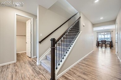 You are welcomed into this home with beautiful har