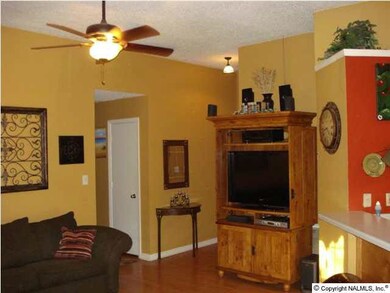 You will love the cozy family room with high ceilings, ceiling fan, New Laminate floors.