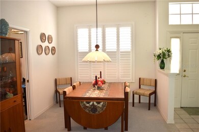 Formal dining room with brilliant Teak light fixtu