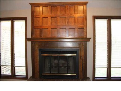 Living room fireplace. Look at the wood shine.