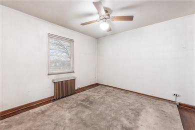 Bedroom 1 - Hardwood flooring visible